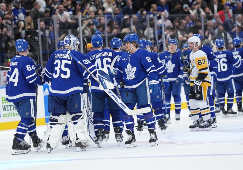 Apr 8, 2024; Toronto, Ontario, CAN; Toronto Maple Leafs right wing William Nylander (88) celebrates the overtime win with goaltender Ilya Samsonov (35) against the Pittsburgh Penguins during the overtime period at Scotiabank Arena. Mandatory Credit: Nick Turchiaro-USA TODAY Sports