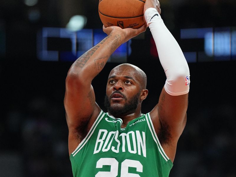 ABU DHABI, UAE - OCTOBER 6: Xavier Tillman #26 of the Boston Celtics shoots the ball during the game against the Denver Nuggets during the 2024 Global Games on October 6, 2024 at the Etihad Arena in Abu Dhabi, United Arab Emirates. NOTE TO USER: User expressly acknowledges and agrees that, by downloading and/or using this Photograph, user is consenting to the terms and conditions of the Getty Images License Agreement. Mandatory Copyright Notice: Copyright 2024 NBAE (Photo by Garrett Ellwood/NBAE via Getty Images)