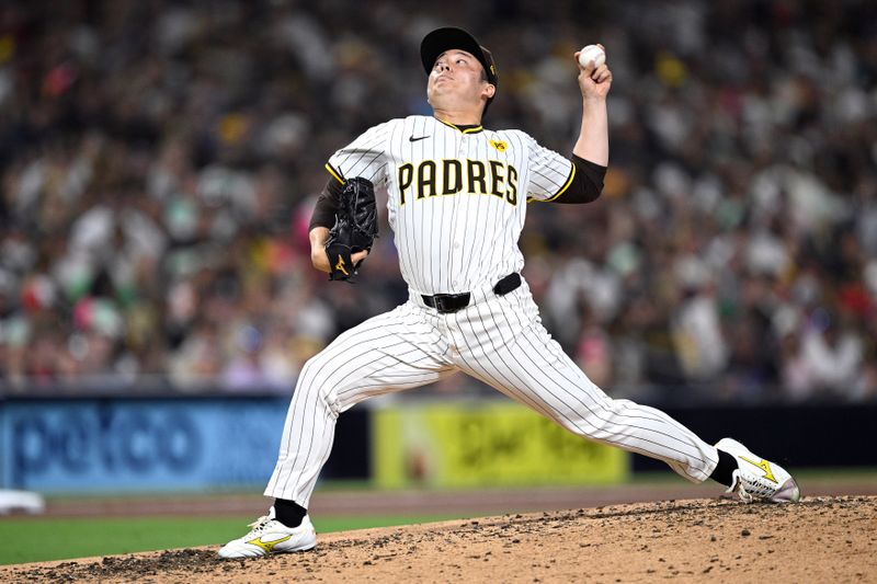 Jul 6, 2024; San Diego, California, USA; San Diego Padres relief pitcher Yuki Matsui (1) pitches against the Arizona Diamondbacks during the seventh inning at Petco Park. Mandatory Credit: Orlando Ramirez-USA TODAY Sports