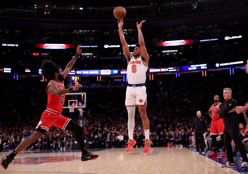 NEW YORK, NEW YORK - JANUARY 03: Quentin Grimes #6 of the New York Knicks takes a three point shot as Coby White #0 of the Chicago Bulls defends during the first half at Madison Square Garden on January 03, 2024 in New York City. NOTE TO USER: User expressly acknowledges and agrees that, by downloading and or using this photograph, User is consenting to the terms and conditions of the Getty Images License Agreement. (Photo by Elsa/Getty Images)