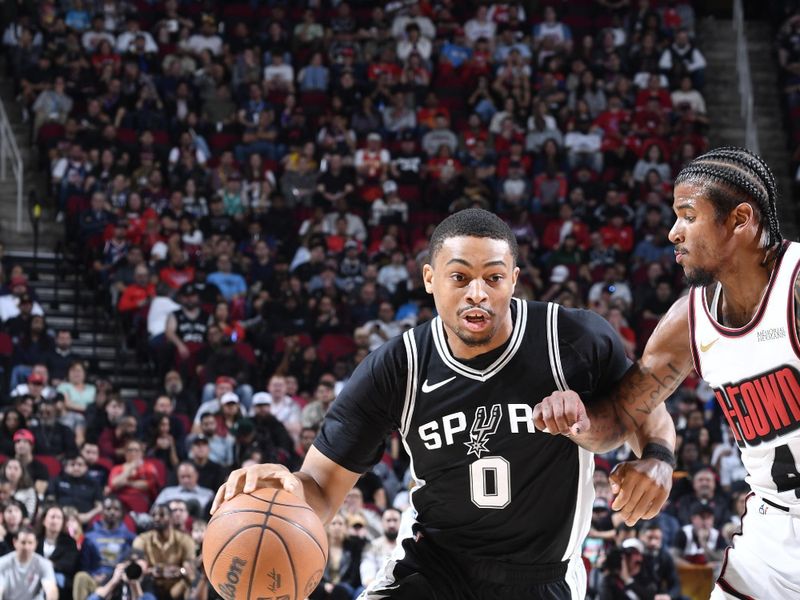 HOUSTON, TX - FEBRUARY 26:   Keldon Johnson #0 of the San Antonio Spurs dribbles the ball during the game against the Houston Rockets on February 26, 2025 at the Toyota Center in Houston, Texas. NOTE TO USER: User expressly acknowledges and agrees that, by downloading and or using this photograph, User is consenting to the terms and conditions of the Getty Images License Agreement. Mandatory Copyright Notice: Copyright 2025 NBAE (Photo by Logan Riely/NBAE via Getty Images)