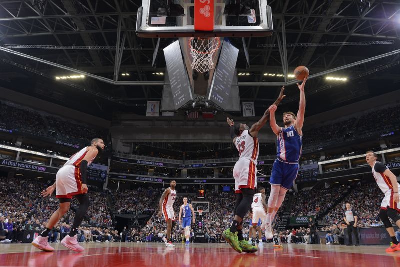 SACRAMENTO, CA - FEBRUARY 26: Domantas Sabonis #10 of the Sacramento Kings drives to the basket during the game against the Miami Heat on February 26, 2024 at Golden 1 Center in Sacramento, California. NOTE TO USER: User expressly acknowledges and agrees that, by downloading and or using this Photograph, user is consenting to the terms and conditions of the Getty Images License Agreement. Mandatory Copyright Notice: Copyright 2024 NBAE (Photo by Rocky Widner/NBAE via Getty Images)