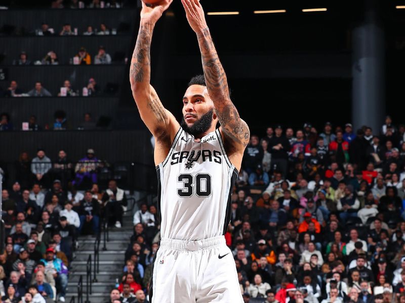 BROOKLYN, NY - FEBRUARY 10: Julian Champagnie #30 of the San Antonio Spurs three point basket during the game against the Brooklyn Nets on February 10, 2024 at Barclays Center in Brooklyn, New York. NOTE TO USER: User expressly acknowledges and agrees that, by downloading and or using this Photograph, user is consenting to the terms and conditions of the Getty Images License Agreement. Mandatory Copyright Notice: Copyright 2024 NBAE (Photo by David L. Nemec/NBAE via Getty Images)