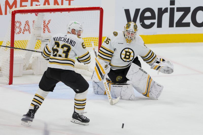 Nov 22, 2023; Sunrise, Florida, USA; Boston Bruins goaltender Linus Ullmark (35) watches the puck against the Florida Panthers during the third period at Amerant Bank Arena. Mandatory Credit: Sam Navarro-USA TODAY Sports