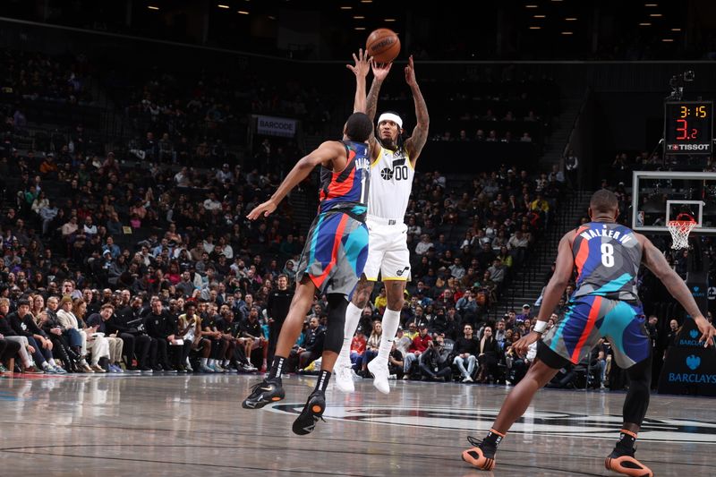 BROOKLYN, NY - JANUARY 29: Jordan Clarkson #00 of the Utah Jazz shoots a three point basket against the Brooklyn Nets on January 29, 2024 at Barclays Center in Brooklyn, New York. NOTE TO USER: User expressly acknowledges and agrees that, by downloading and or using this Photograph, user is consenting to the terms and conditions of the Getty Images License Agreement. Mandatory Copyright Notice: Copyright 2024 NBAE (Photo by Nathaniel S. Butler/NBAE via Getty Images)