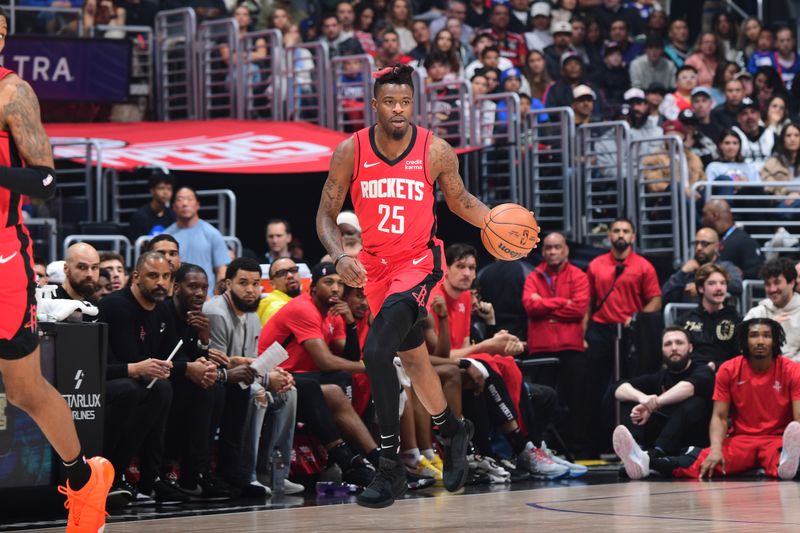 LOS ANGELES, CA - APIRL 14: Reggie Bullock Jr. #25 of the Houston Rockets dribbles the ball during the game against the LA Clippers on April 14, 2024 at Crypto.Com Arena in Los Angeles, California. NOTE TO USER: User expressly acknowledges and agrees that, by downloading and/or using this Photograph, user is consenting to the terms and conditions of the Getty Images License Agreement. Mandatory Copyright Notice: Copyright 2024 NBAE (Photo by Adam Pantozzi/NBAE via Getty Images)