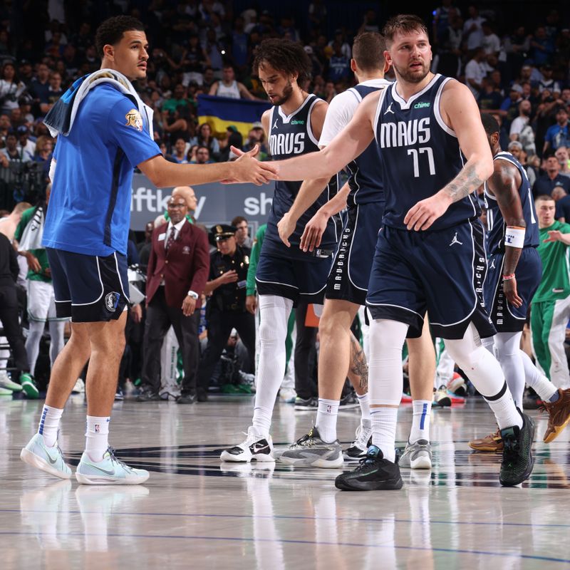 DALLAS, TX - JUNE 12: Josh Green #8 high fives Luka Doncic #77 of the Dallas Mavericks during the game against the Boston Celtics during Game 3 of the 2024 NBA Finals on June 12, 2024 at the American Airlines Center in Dallas, Texas. NOTE TO USER: User expressly acknowledges and agrees that, by downloading and or using this photograph, User is consenting to the terms and conditions of the Getty Images License Agreement. Mandatory Copyright Notice: Copyright 2024 NBAE (Photo by Nathaniel S. Butler/NBAE via Getty Images)