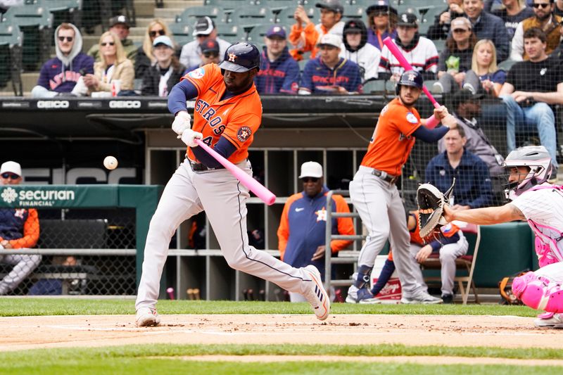 May 14, 2023; Chicago, Illinois, USA; Houston Astros left fielder Yordan Alvarez (44) hits a two-run double against the Chicago White Sox during the first inning at Guaranteed Rate Field. Mandatory Credit: David Banks-USA TODAY Sports