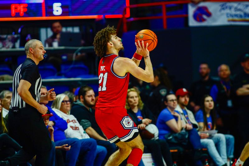 Feb 17, 2024; Boise, Idaho, USA; Fresno State Bulldogs guard Isaiah Pope (21) shoots during the second half against the Boise State Broncos at ExtraMile Arena.Boise State defeats Fresno State 90-66.  Mandatory Credit: Brian Losness-USA TODAY Sports
