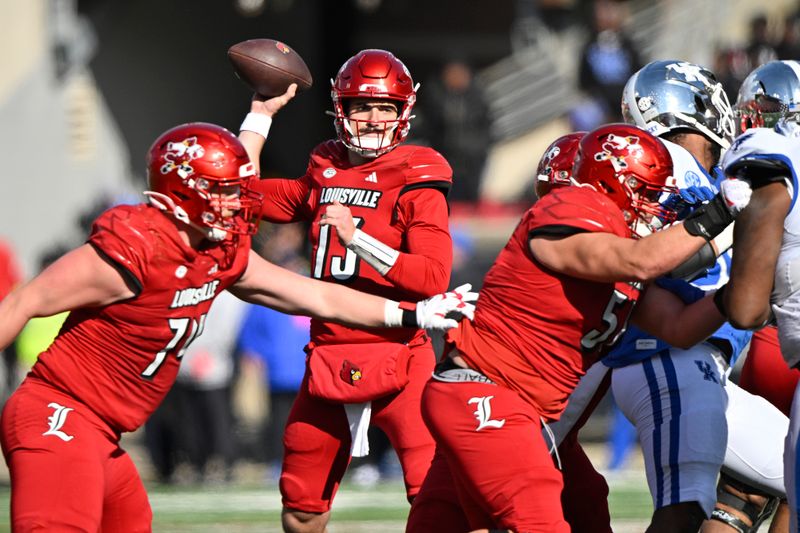 Nov 25, 2023; Louisville, Kentucky, USA;  Louisville Cardinals quarterback Jack Plummer (13) looks to pass against the Kentucky Wildcats during the first half at L&N Federal Credit Union Stadium. Mandatory Credit: Jamie Rhodes-USA TODAY Sports