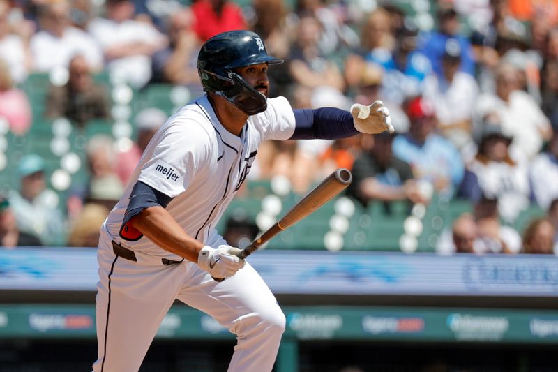 May 1, 2024; Detroit, Michigan, USA; Detroit Tigers left fielder Riley Greene (31) hits a double in the first inning against the St. Louis Cardinals at Comerica Park. Mandatory Credit: Rick Osentoski-USA TODAY Sports