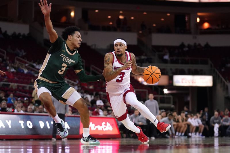 Feb 3, 2024; Fresno, California, USA; Fresno State Bulldogs guard Isaiah Hill (3) dribbles past Colorado State Rams guard Josiah Strong (3) in the second half at the Save Mart Center. Mandatory Credit: Cary Edmondson-USA TODAY Sports