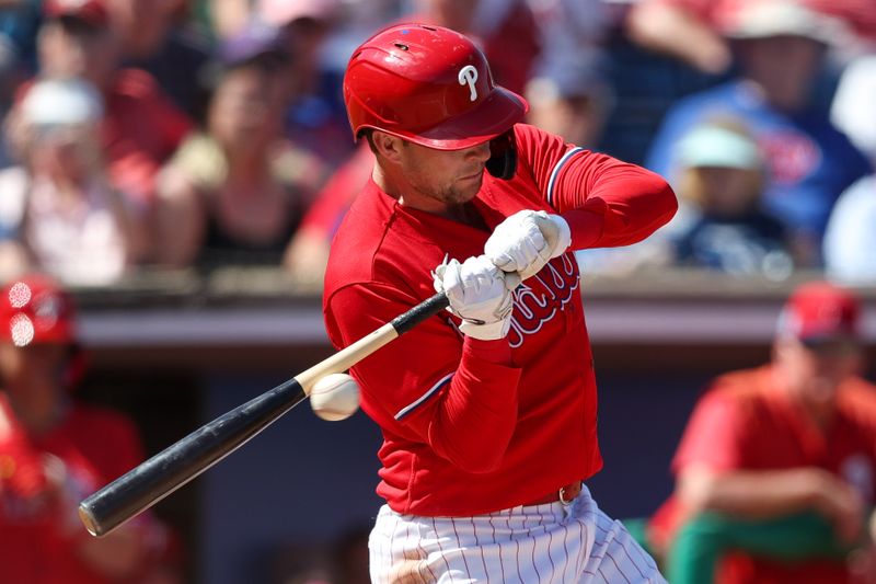 Mar 7, 2023; Clearwater, Florida, USA;  Philadelphia Phillies first baseman Rhys Hoskins (17) fouls off a ball inside against the Tampa Bay Rays in the third inning during spring training at BayCare Ballpark. Mandatory Credit: Nathan Ray Seebeck-USA TODAY Sports