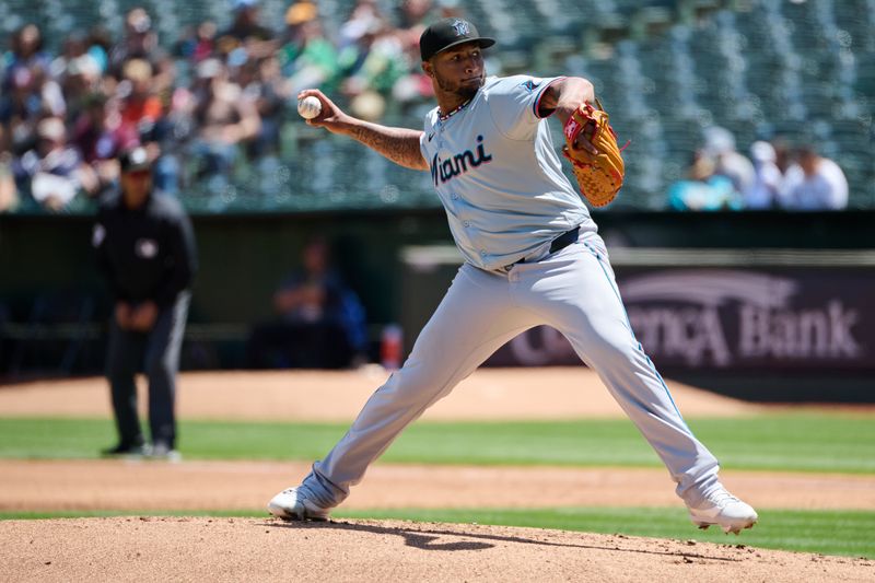May 5, 2024; Oakland, California, USA; Miami Marlins starting pitcher Sixto Sanchez (18) throws a pitch against the Oakland Athletics during the first inning at Oakland-Alameda County Coliseum. Mandatory Credit: Robert Edwards-USA TODAY Sports