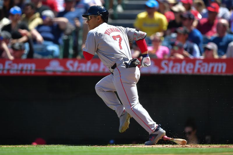 Apr 7, 2024; Anaheim, California, USA; Boston Red Sox designated hitter Masataka Yoshida (7) hits against the Los Angeles Angels during the fourth inning at Angel Stadium. Mandatory Credit: Gary A. Vasquez-USA TODAY Sports