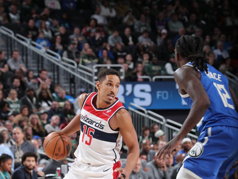 MILWAUKEE, WI - NOVEMBER 30: Malcolm Brogdon #15 of the Washington Wizards handles the ball during the game against the Milwaukee Bucks on November 30, 2024 at Fiserv Forum Center in Milwaukee, Wisconsin. NOTE TO USER: User expressly acknowledges and agrees that, by downloading and or using this Photograph, user is consenting to the terms and conditions of the Getty Images License Agreement. Mandatory Copyright Notice: Copyright 2024 NBAE (Photo by Gary Dineen/NBAE via Getty Images).