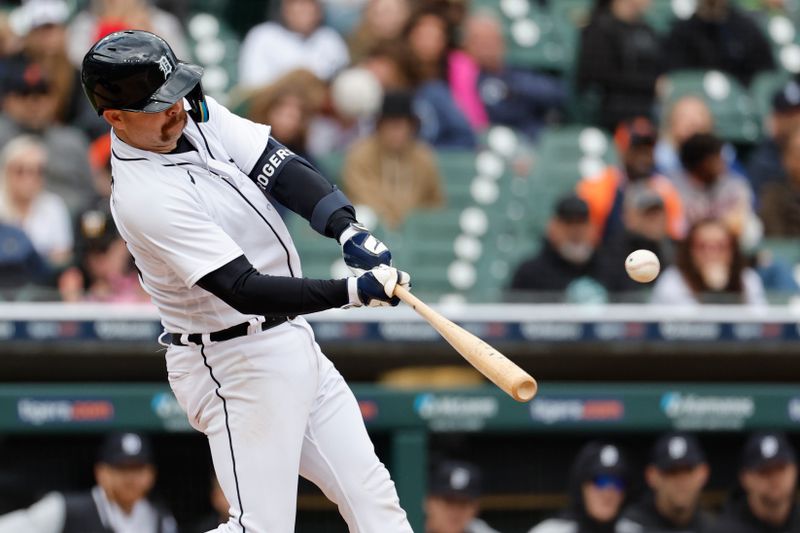 Apr 30, 2023; Detroit, Michigan, USA; Detroit Tigers catcher Jake Rogers (34) hits a two run home run in the fifth inning against the Baltimore Orioles at Comerica Park. Mandatory Credit: Rick Osentoski-USA TODAY Sports