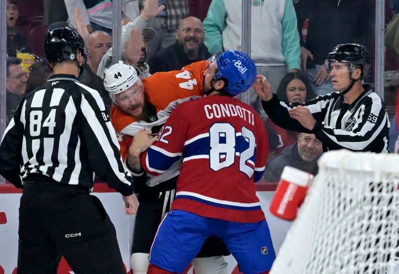 Sep 23, 2024; Montreal, Quebec, CAN; Montreal Canadiens forward Lucas Condotta (82) challenges Philadelphia Flyers forward Nicolas Deslauriers (44) after a hit during the first period at the Bell Centre. Mandatory Credit: Eric Bolte-Imagn Images