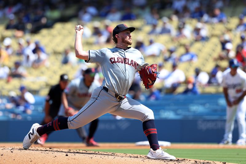 Sep 8, 2024; Los Angeles, California, USA;  Cleveland Guardians starting pitcher Tanner Bibee (28) pitches during the second inning against the Los Angeles Dodgers at Dodger Stadium. Mandatory Credit: Kiyoshi Mio-Imagn Images