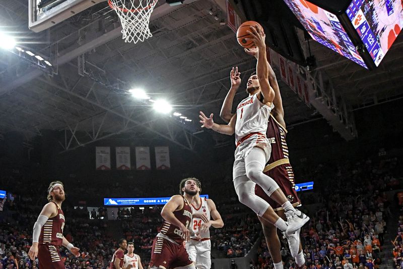 Jan 13, 2024; Clemson, South Carolina, USA; Clemson Tigers guard Chase Hunter (1) scores against the Boston College Eagles during the second half at Littlejohn Coliseum. Mandatory Credit: Ken Ruinard-USA TODAY Sports