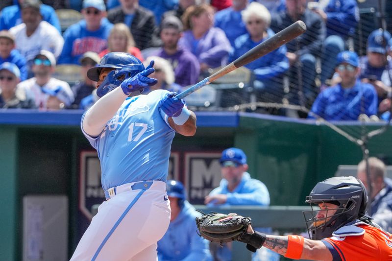 Apr 11, 2024; Kansas City, Missouri, USA; Kansas City Royals left fielder Nelson Velázquez (17) hits a one run double against the Houston Astros in the first inning at Kauffman Stadium. Mandatory Credit: Denny Medley-USA TODAY Sports