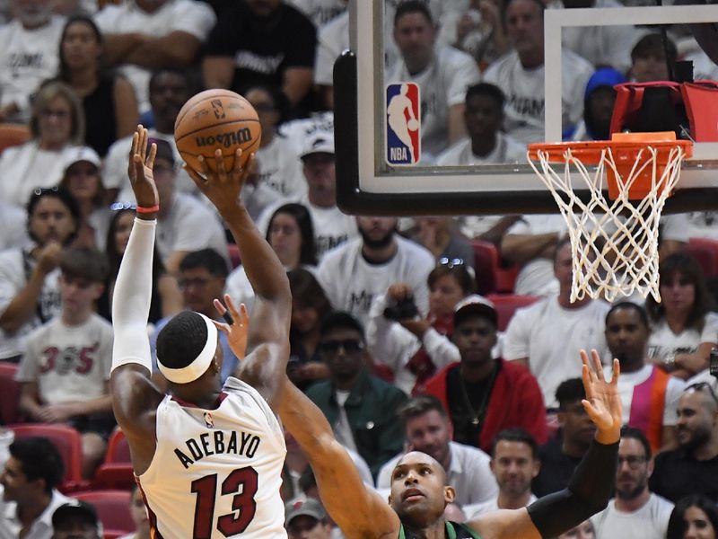 MIAMI, FL - APRIL 27: Bam Adebayo #13 of the Miami Heat shoots the ball during the game against the Boston Celtics during Round 1 Game 3 of the 2024 NBA Playoffs on April 27, 2024 at Kaseya Center in Miami, Florida. NOTE TO USER: User expressly acknowledges and agrees that, by downloading and or using this Photograph, user is consenting to the terms and conditions of the Getty Images License Agreement. Mandatory Copyright Notice: Copyright 2024 NBAE (Photo by Brian Babineau/NBAE via Getty Images)