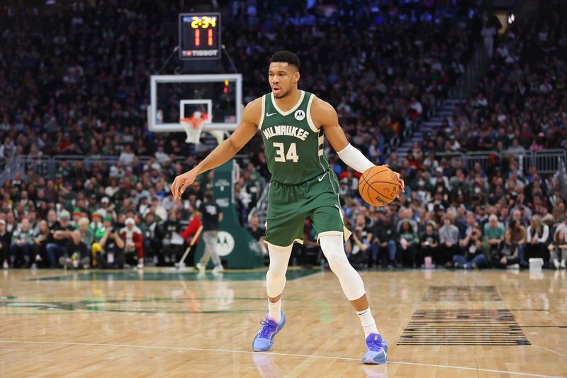 MILWAUKEE, WISCONSIN - DECEMBER 21: Giannis Antetokounmpo #34 of the Milwaukee Bucks handles the ball during a game against the Orlando Magic at Fiserv Forum on December 21, 2023 in Milwaukee, Wisconsin. NOTE TO USER: User expressly acknowledges and agrees that, by downloading and or using this photograph, User is consenting to the terms and conditions of the Getty Images License Agreement. (Photo by Stacy Revere/Getty Images)