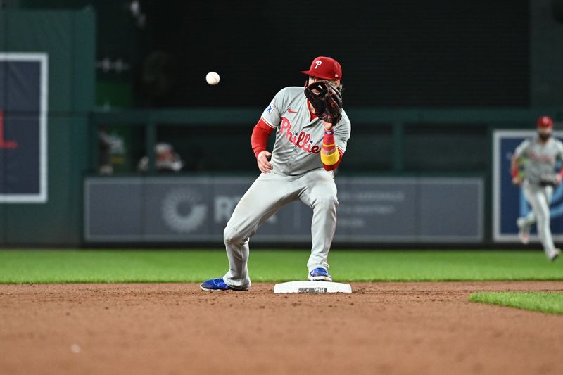 Sep 27, 2024; Washington, District of Columbia, USA;  Philadelphia Phillies second baseman Bryson Stott (5) completes a force out at second base during the sixth inning against the Washington Nationals at Nationals Park. Mandatory Credit: James A. Pittman-Imagn Images