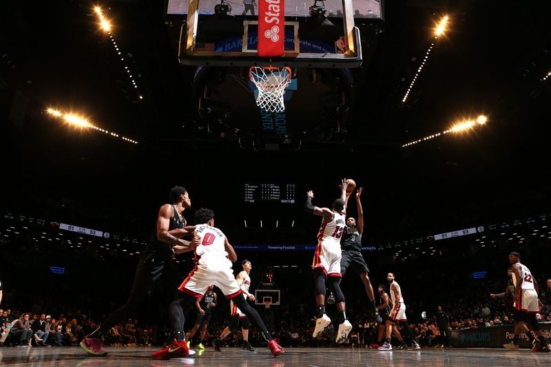 BROOKLYN, NY - JANUARY 15: Mikal Bridges #1 of the Brooklyn Nets shoots the ball during the game against the Miami Heat on January 15, 2024 at Barclays Center in Brooklyn, New York. NOTE TO USER: User expressly acknowledges and agrees that, by downloading and or using this Photograph, user is consenting to the terms and conditions of the Getty Images License Agreement. Mandatory Copyright Notice: Copyright 2024 NBAE (Photo by Nathaniel S. Butler/NBAE via Getty Images)