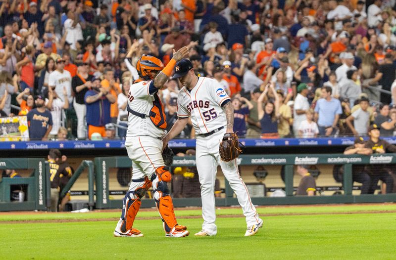 Sep 9, 2023; Houston, Texas, USA; Houston Astros relief pitcher Ryan Pressly (55) and catcher Martin Maldonado (15) celebrates the win after defeating the San Diego Padres at Minute Maid Park. Mandatory Credit: Thomas Shea-USA TODAY Sports