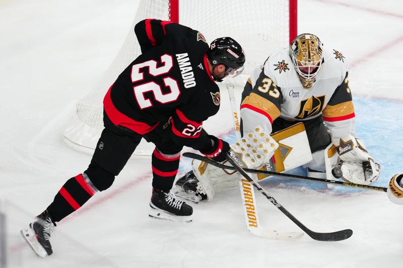 Oct 25, 2024; Las Vegas, Nevada, USA; Vegas Golden Knights goaltender Adin Hill (33) makes a save against Ottawa Senators right wing Michael Amadio (22) during the third period at T-Mobile Arena. Mandatory Credit: Stephen R. Sylvanie-Imagn Images