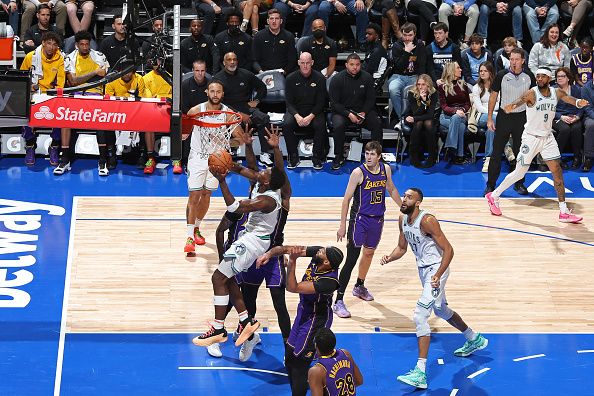 MINNEAPOLIS, MN -  DECEMBER 30: Anthony Edwards #5 of the Minnesota Timberwolves drives to the basket during the game against the Los Angeles Lakers on December 30, 2023 at Target Center in Minneapolis, Minnesota. NOTE TO USER: User expressly acknowledges and agrees that, by downloading and or using this Photograph, user is consenting to the terms and conditions of the Getty Images License Agreement. Mandatory Copyright Notice: Copyright 2023 NBAE (Photo by David Sherman/NBAE via Getty Images)