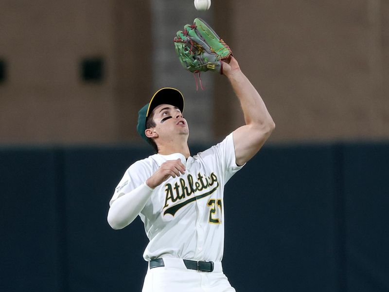 Sep 27, 2025; West Sacramento, California, USA; Athletics left fielder Tyler Soderstrom (21) catches a fly ball against the Kansas City Royals during the fifth inning at Sutter Health Park. Mandatory Credit: Dennis Lee-Imagn Images