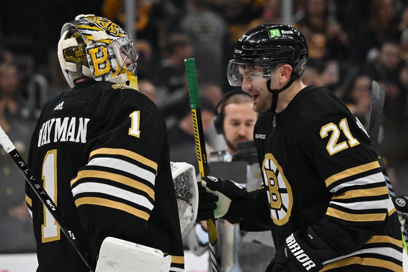 Oct 14, 2023; Boston, Massachusetts, USA; Boston Bruins left wing James van Riemsdyk (21) hugs goaltender Jeremy Swayman (1) after a game against the Nashville Predators at the TD Garden. Mandatory Credit: Brian Fluharty-USA TODAY Sports