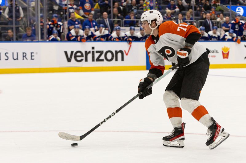 Nov 25, 2023; Elmont, New York, USA; Philadelphia Flyers right wing Tyson Foerster (71) skates towards the goal against the New York Islanders during the overtime shootout at UBS Arena. Mandatory Credit: Thomas Salus-USA TODAY Sports