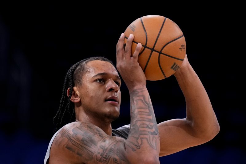 ORLANDO, FLORIDA - MARCH 23: Paolo Banchero #5 of the Orlando Magic warms up prior to a game against the Sacramento Kings at Kia Center on March 23, 2024 in Orlando, Florida. NOTE TO USER: User expressly acknowledges and agrees that, by downloading and or using this photograph, User is consenting to the terms and conditions of the Getty Images License Agreement. (Photo by Rich Storry/Getty Images)