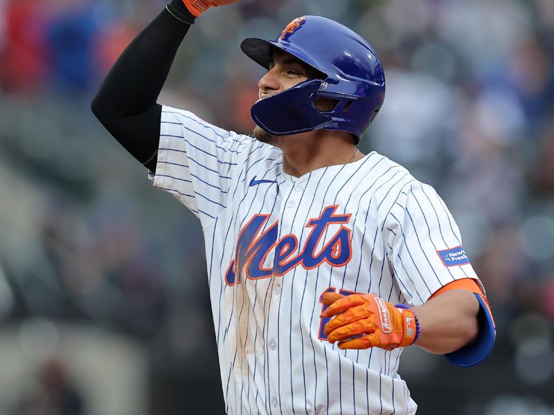 Apr 17, 2024; New York City, New York, USA; New York Mets right fielder Tyrone Taylor (15) reacts after his two run single against the Pittsburgh Pirates during the sixth inning at Citi Field. Mandatory Credit: Brad Penner-USA TODAY Sports