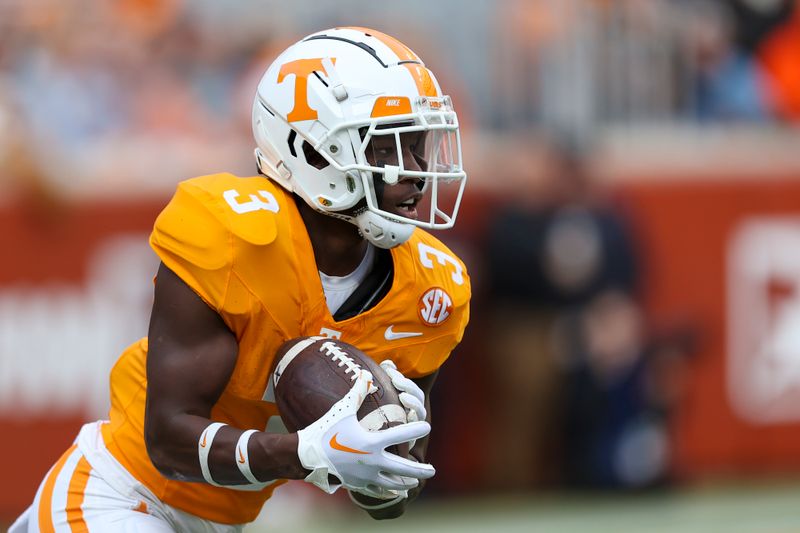 Nov 25, 2023; Knoxville, Tennessee, USA; Tennessee Volunteers defensive back Dee Williams (3) runs the ball against the Vanderbilt Commodores during the first half at Neyland Stadium. Mandatory Credit: Randy Sartin-USA TODAY Sports