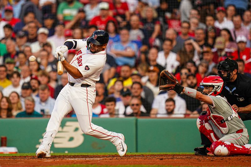 Jun 13, 2024; Boston, Massachusetts, USA; Boston Red Sox first baseman Dominic Smith (2) get a hit to drive in a run against the Boston Red Sox in the second inning at Fenway Park. Mandatory Credit: David Butler II-USA TODAY Sports