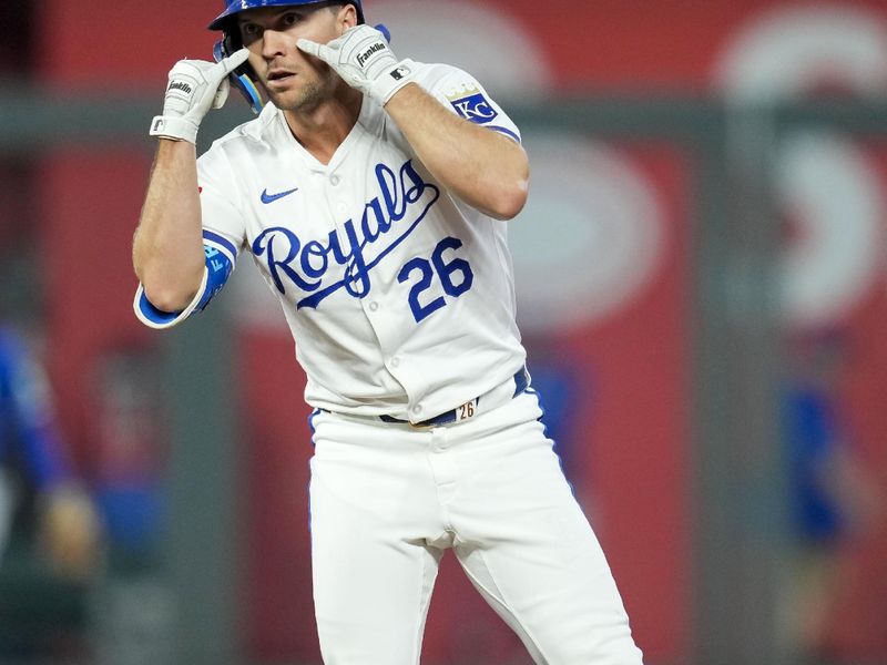 Apr 23, 2024; Kansas City, Missouri, USA; Kansas City Royals designated hitter Adam Frazier (26) gestures to the dugout after hitting a double against the Toronto Blue Jays during the fifth inning at Kauffman Stadium. Mandatory Credit: Jay Biggerstaff-USA TODAY Sports