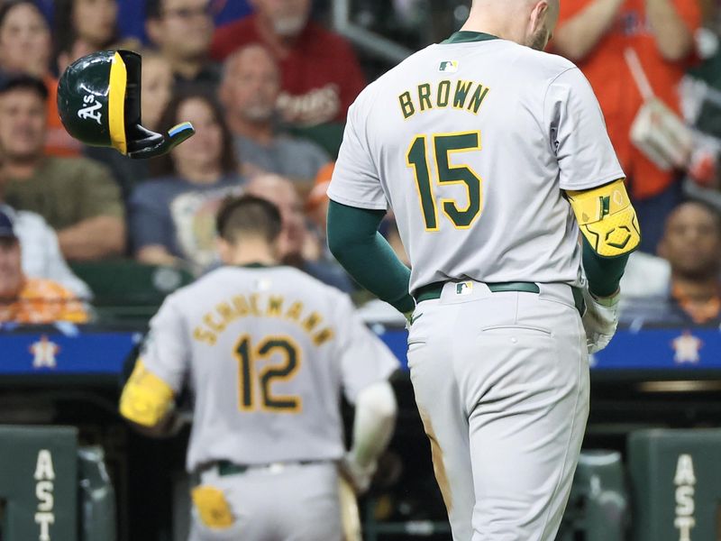 May 13, 2024; Houston, Texas, USA; Oakland Athletics left fielder Seth Brown (15) reacts after he struck out with two men in scoring position to end the eighth inning at Minute Maid Park. Mandatory Credit: Thomas Shea-USA TODAY Sports