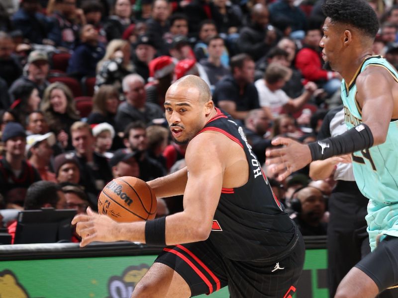 CHICAGO, IL - DECEMBER 13: Talen Horton-Tucker #22 of the Chicago Bulls dribbles the ball during the game against the Charlotte Hornets on December 13, 2024 at United Center in Chicago, Illinois. NOTE TO USER: User expressly acknowledges and agrees that, by downloading and or using this photograph, User is consenting to the terms and conditions of the Getty Images License Agreement. Mandatory Copyright Notice: Copyright 2024 NBAE (Photo by Jeff Haynes/NBAE via Getty Images)