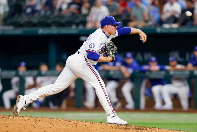 Sep 4, 2024; Arlington, Texas, USA; Texas Rangers pitcher Walter Pennington (52) throws during the eighth inning against the New York Yankees at Globe Life Field. Mandatory Credit: Andrew Dieb-Imagn Images