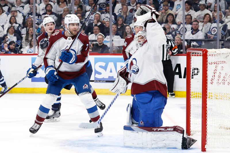 Apr 30, 2024; Winnipeg, Manitoba, CAN; Colorado Avalanche goaltender Alexandar Georgiev (40) makes a high glove save against the Winnipeg Jets in the second period in game five of the first round of the 2024 Stanley Cup Playoffs at Canada Life Centre. Mandatory Credit: James Carey Lauder-USA TODAY Sports