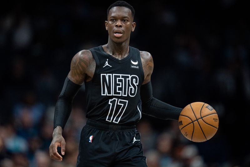 CHARLOTTE, NORTH CAROLINA - MARCH 09: Dennis Schroder #17 of the Brooklyn Nets brings the ball up court in the second quarter during their game against the Charlotte Hornets at Spectrum Center on March 09, 2024 in Charlotte, North Carolina. NOTE TO USER: User expressly acknowledges and agrees that, by downloading and or using this photograph, User is consenting to the terms and conditions of the Getty Images License Agreement. (Photo by Jacob Kupferman/Getty Images)