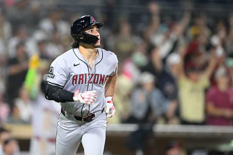 July 5, 2024; San Diego, California, USA; Arizona Diamondbacks center fielder Alek Thomas (5) hits a grand slam during the ninth inning against the San Diego Padres at Petco Park. Mandatory Credit: Denis Poroy-USA TODAY Sports