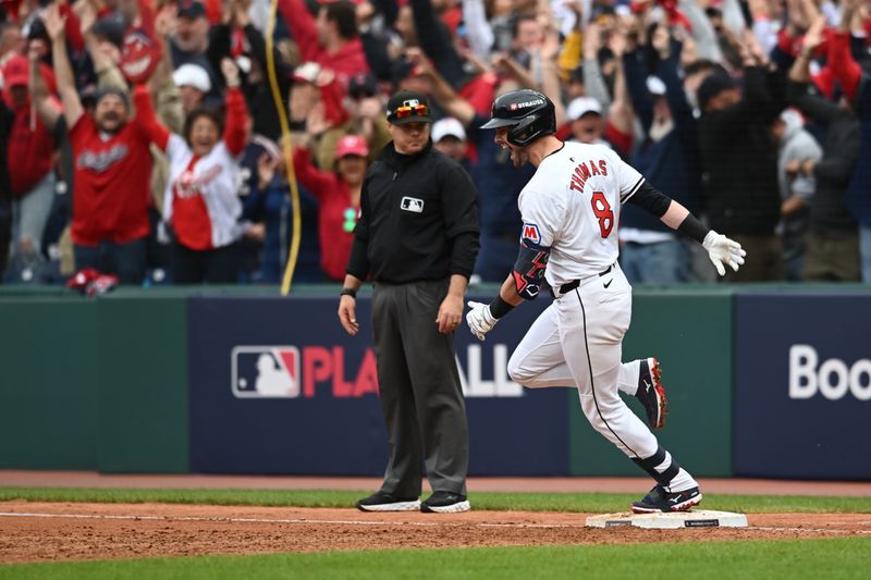 Oct 12, 2024; Cleveland, Ohio, USA; Cleveland Guardians outfielder Lane Thomas (8) runs the bases after hitting a grand slam in the fifth inning against the Detroit Tigers during game five of the ALDS for the 2024 MLB Playoffs at Progressive Field. Mandatory Credit: Ken Blaze-Imagn Images