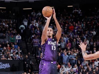 SACRAMENTO, CA - DECEMBER 23: Keegan Murray #13 of the Sacramento Kings shoots a three point basket against the Minnesota Timberwolves on December 23, 2023 at Golden 1 Center in Sacramento, California. NOTE TO USER: User expressly acknowledges and agrees that, by downloading and or using this Photograph, user is consenting to the terms and conditions of the Getty Images License Agreement. Mandatory Copyright Notice: Copyright 2023 NBAE (Photo by Rocky Widner/NBAE via Getty Images)