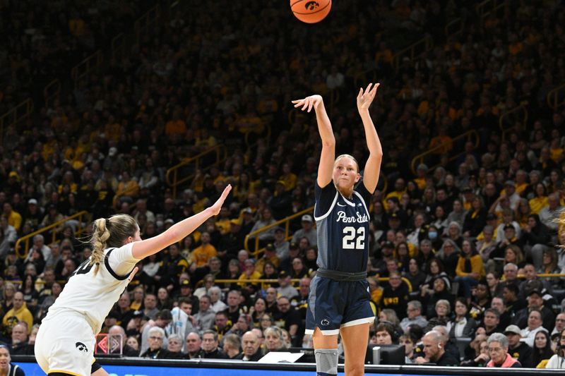 Feb 8, 2024; Iowa City, Iowa, USA; Penn State Nittany Lions guard Alli Campbell (22) shoots the ball over Iowa Hawkeyes guard Kate Martin (20) during the first half at Carver-Hawkeye Arena. Mandatory Credit: Jeffrey Becker-USA TODAY Sports