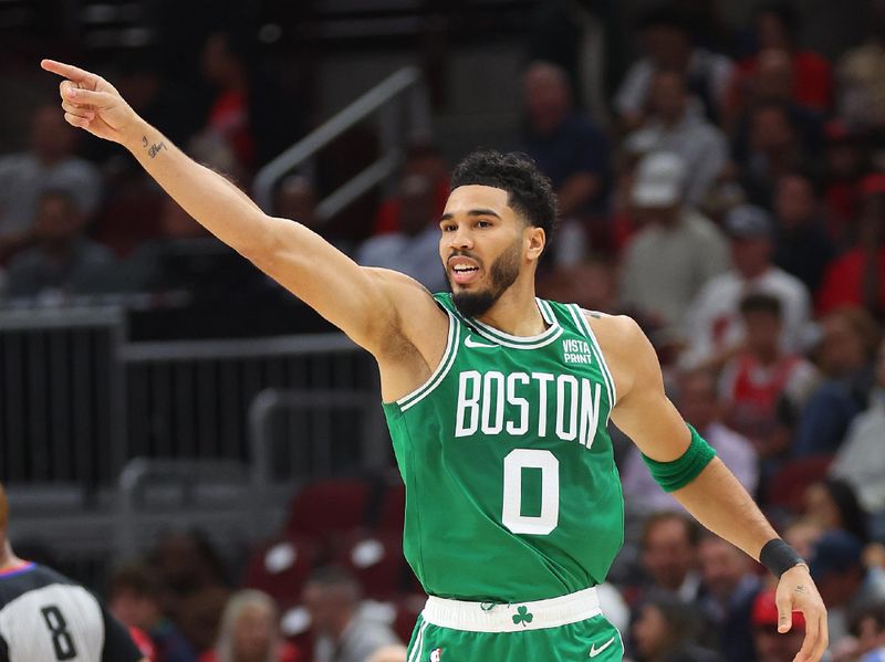 CHICAGO, ILLINOIS - OCTOBER 24: Jayson Tatum #0 of the Boston Celtics celebrates against the Chicago Bulls during the first half at United Center on October 24, 2022 in Chicago, Illinois. NOTE TO USER: User expressly acknowledges and agrees that, by downloading and or using this photograph, User is consenting to the terms and conditions of the Getty Images License Agreement. (Photo by Michael Reaves/Getty Images)